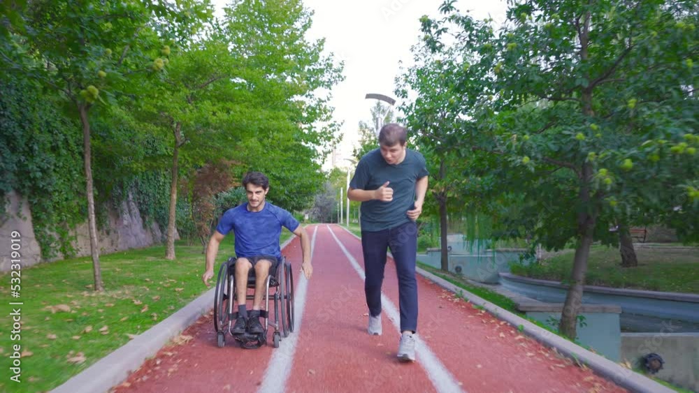 Disabled teenager doing sports in a wheelchair and his friend accompanying him.
Disabled young man drives his wheelchair fast.
Disabled teenager doing sports in a wheelchair and his friend accompanying him.
Disabled young man drives his wheelchair fast.