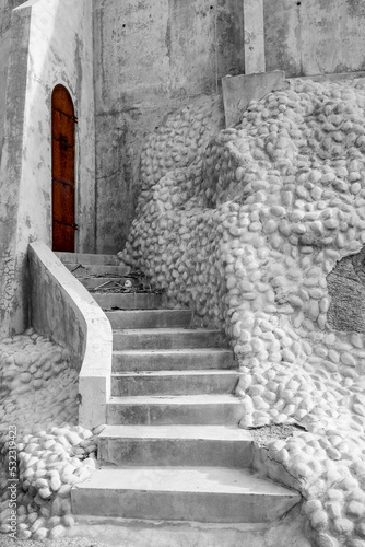 Stone stairs with iron door to beach house in Vieques, Puerto Rico