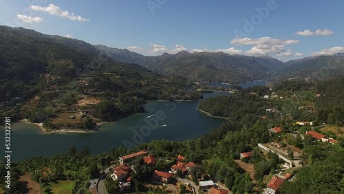 Wonderful Natural Landscape from Portugal. Flying Over Green Mountain Forest and river Cávado. National Park of Gerês Portugal 4k. Summer day photo