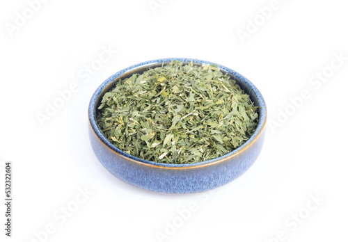 Alfalfa Leaf, Cut and Sifted, in Blue Pottery Bowl that is Isolated on White