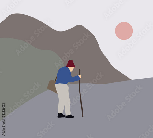 Active senior hiking in mountains with stick, enjoying their adventure. Healthy lifestyle at retirement age. Outdoor activities.