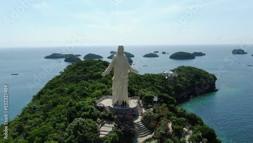 4k Aerial Drone shot of statue of Jesus Christ in pangasinan alaminos hundred islands philippines  photo