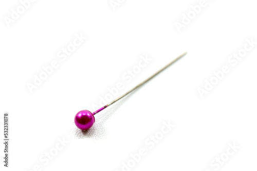 pink sewing straight pin isolated on white background.