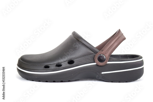 Black rubber sandals covering toes isolated on white background