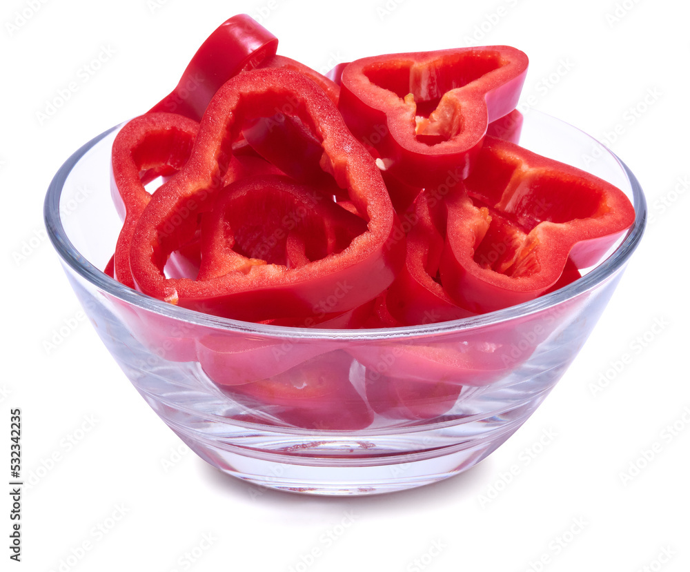 sliced red pepper in glass bowl isolated on white background sliced red pepper in glass bowl isolated on white background