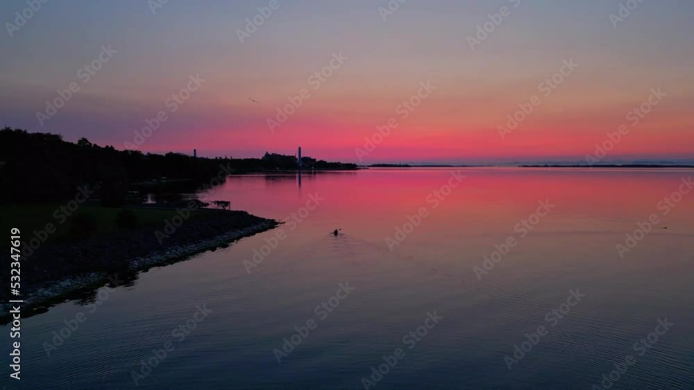 red glow Morning kayaking into the sunrise red glow Morning kayaking into the sunrise