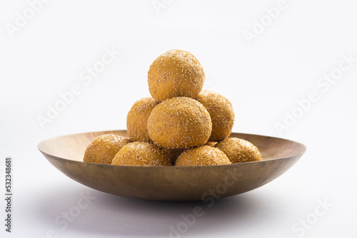 Khas khas besan laddu or poppy seeds and chickpea flour laddo or laddoo photo