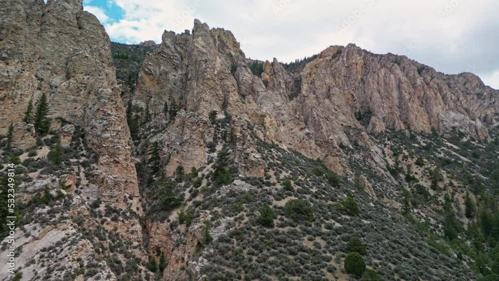 Flying towards the sharp jagged cliffs of the Windy Ridge in Utah near Flaming Gorge. Flying towards the sharp jagged cliffs of the Windy Ridge in Utah near Flaming Gorge.