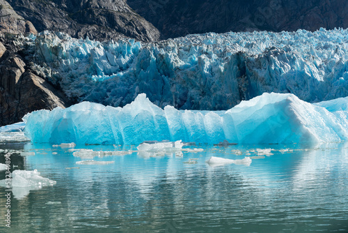 Ice berg floating near the face of South Sawyer Glacier in South East Alaska