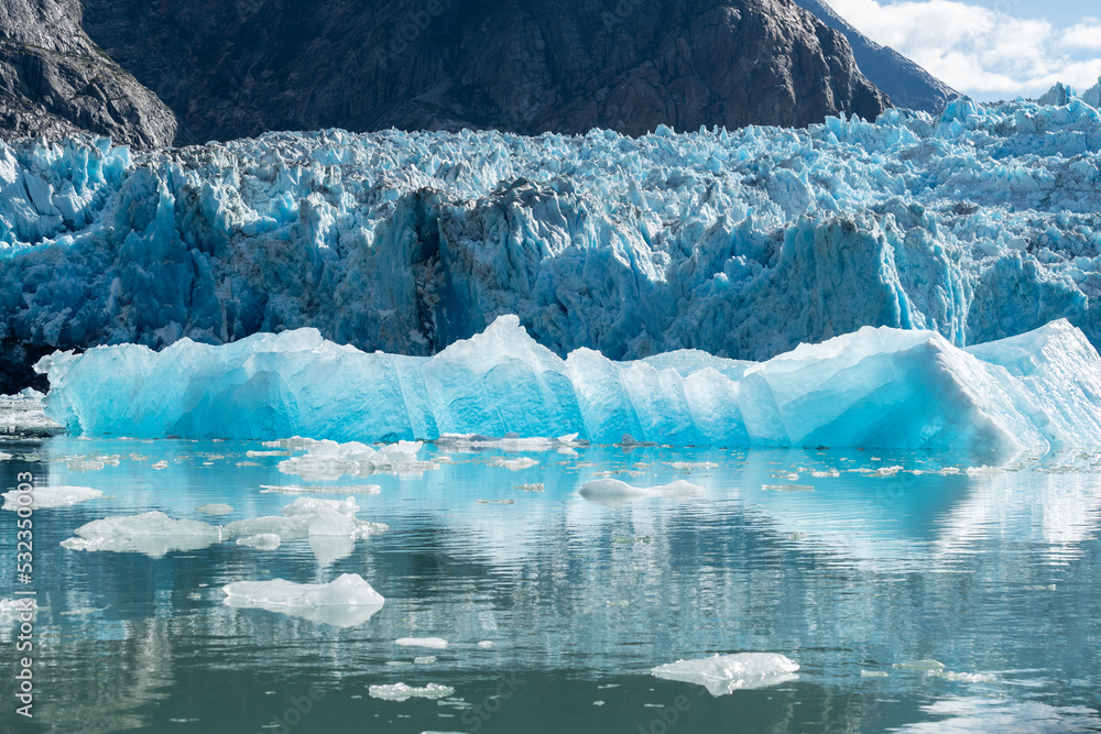 Ice berg floating near the face of South Sawyer Glacier in South East Alaska