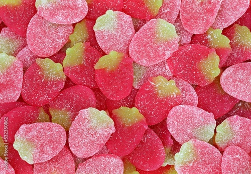 Tasty strawberry candies in top view. Strawberry shape candy. photo