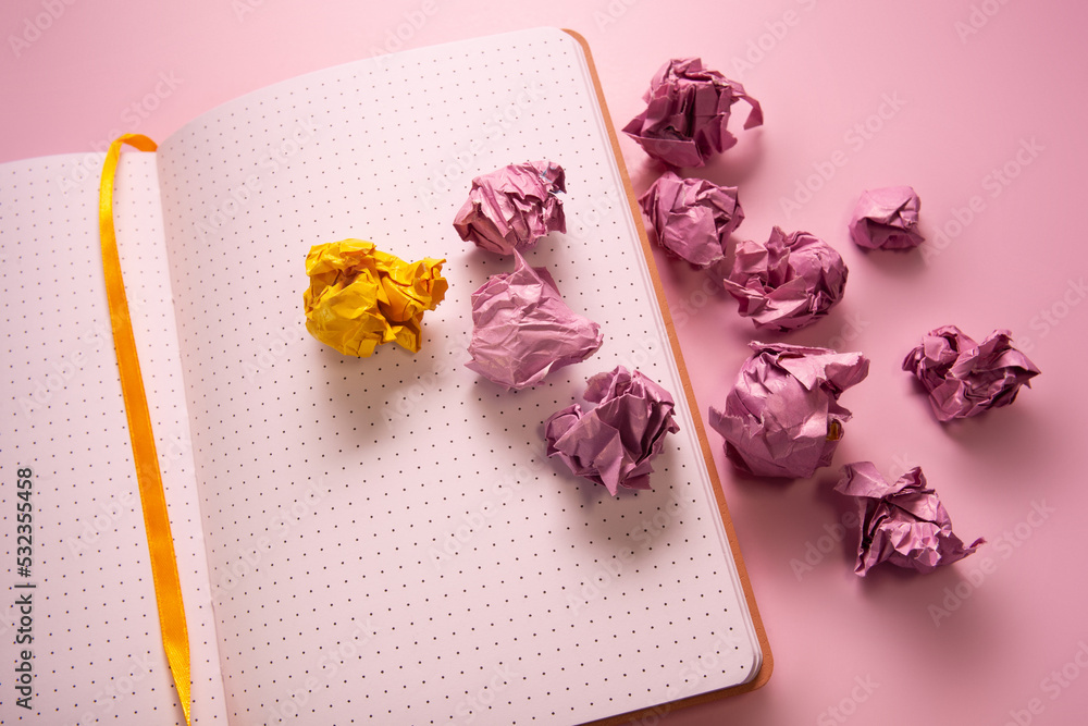 search for the right idea. the creative process. with a crumpled paper ball. think outside the box. finding an unusual solution search for the right idea. the creative process. with a crumpled paper ball. think outside the box. finding an unusual solution