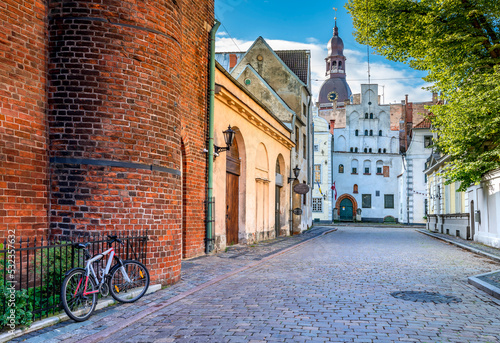 Street leading to the ancient building and medieval church in the old district of Riga, Latvia