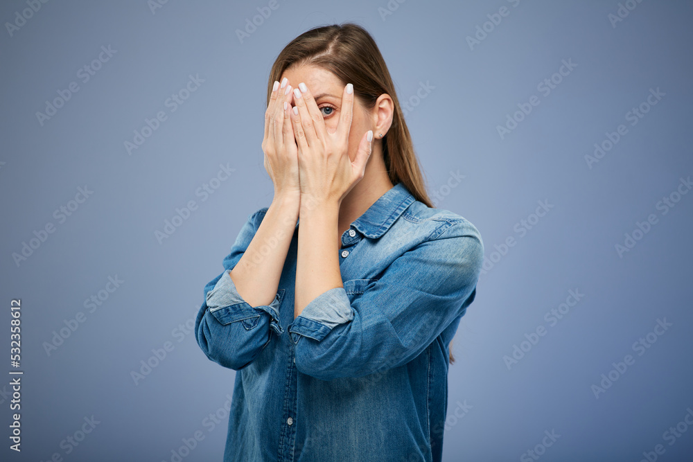 Woman hide her face with hands. isolated female portrait. Woman hide her face with hands. isolated female portrait.