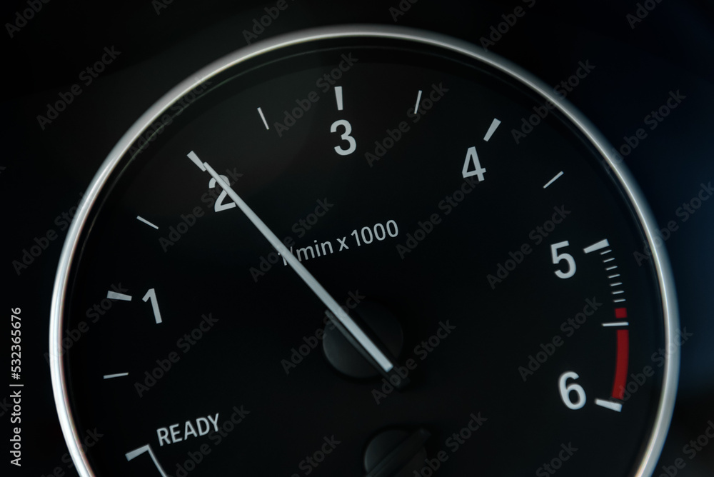 Tachometer or revolution counter, RPM gauge with needle on car dashboard. Tachometer or revolution counter, RPM gauge with needle on car dashboard.