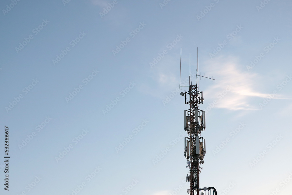 Cellular tower against the blue sky. Modern technologies. Cellular tower against the blue sky. Modern technologies.