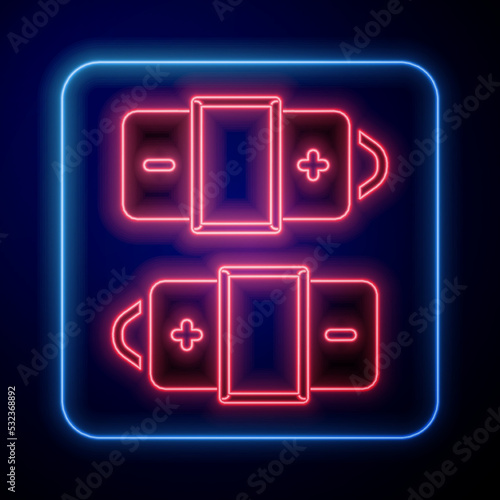 Glowing neon Battery icon isolated on black background. Lightning bolt symbol. Vector