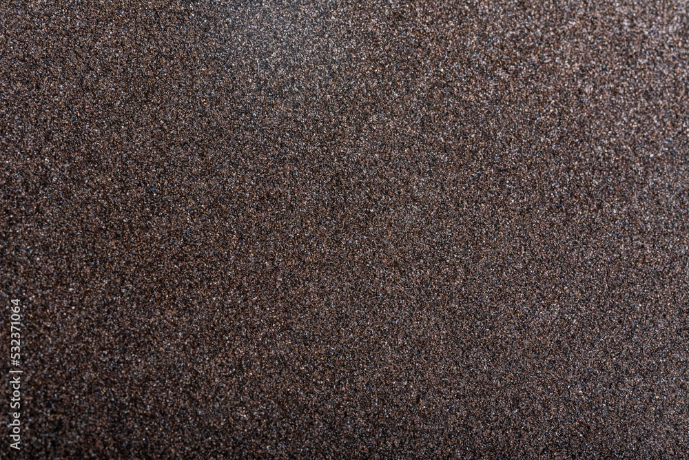 matte grungy sandpaper background closeup matte grungy sandpaper background closeup