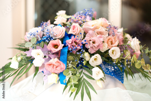 BUNCH OF COLORED ROSES for decoration with green leaves