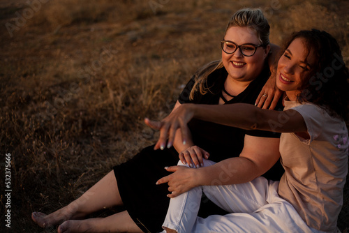 Quadro em tela group of friends, plus size with  thin girl spend happy time together and posing in the nature