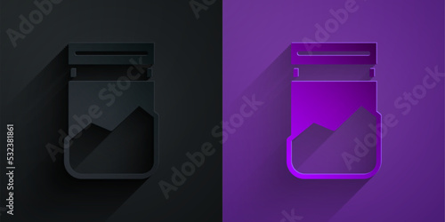 Paper cut Plastic bag of drug icon isolated on black on purple background. Health danger. Paper art style. Vector