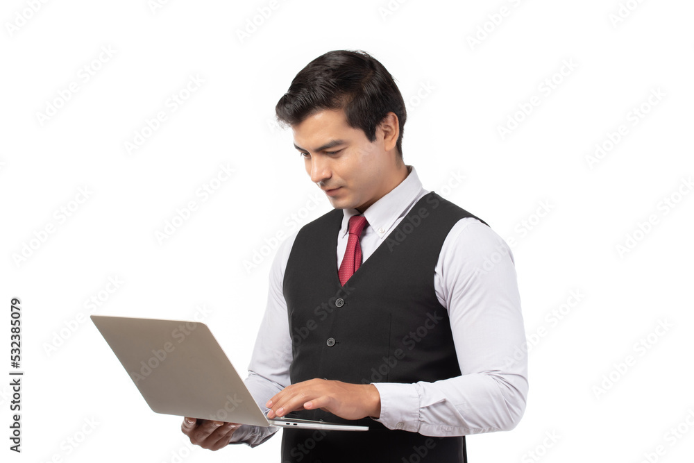 Image of handsome businessmam holding and using laptop isolated on white background. Image of handsome businessmam holding and using laptop isolated on white background.