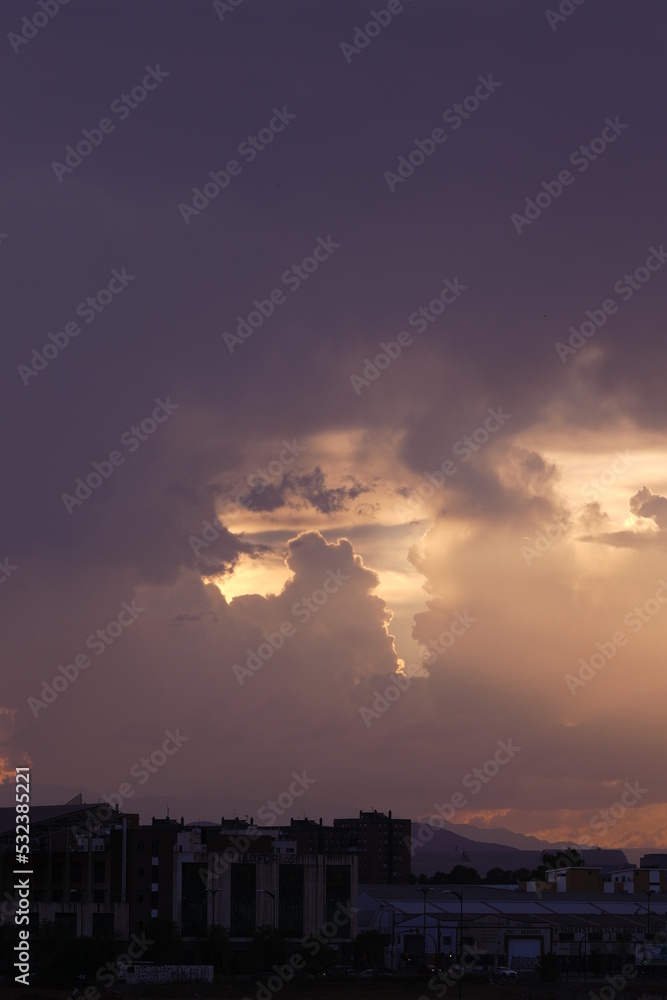 Fototapeta premium Shaped clouds in a beautiful sunset