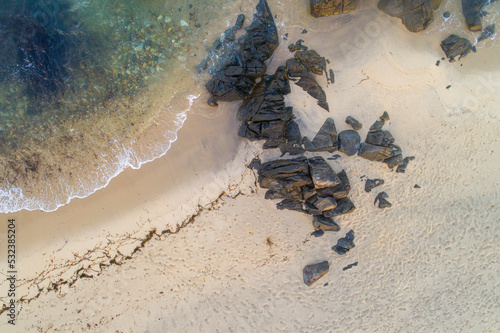 zenithal aerial view of the shore of a beach in the Atlantic ocean photo