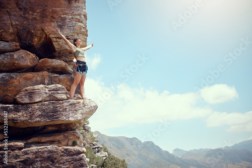 Mountains, success and hiking woman with view of nature environment, countryside landscape or blue sky background. Happy, exercise power or fitness freedom in sports workout or Colorado rock climbing