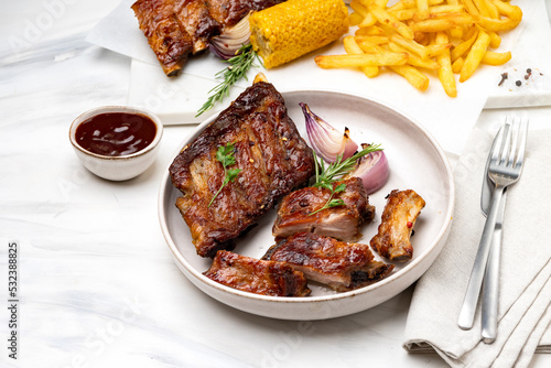 Grilled ribs with barbecue sauce and ketchup	

