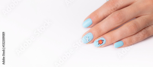 Banner with female hands with winter snow manicure with stickers under a matte top on white background
