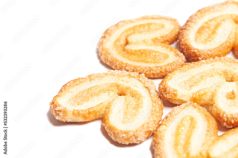 Heart-shaped cookies isolated on white background