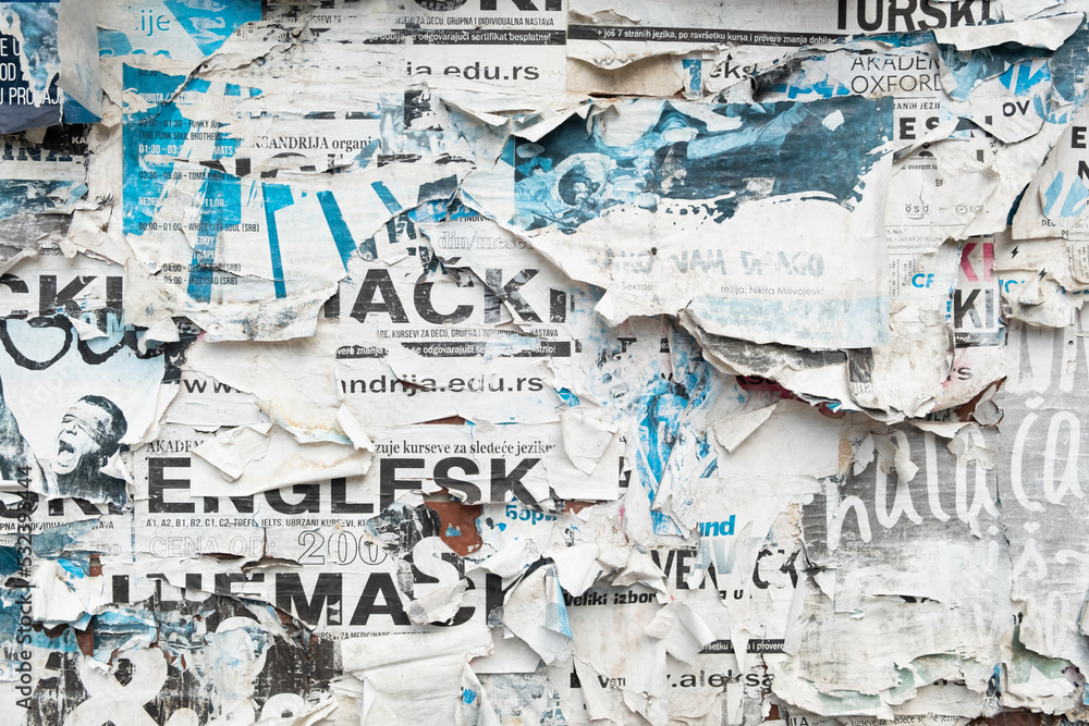 Fototapeta premium Torn street poster background with text, abstract paper collage