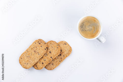 breakfast with espresso cup and chocolate chip cookies on white background