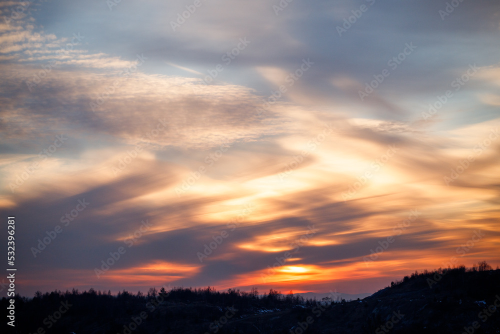 Fototapeta premium Sunset in different colors on the sky, horizon