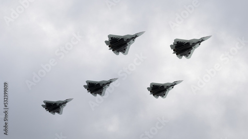 3d render a team of fighter jets in the clouds flying in a group war Russia China Ukraine Taiwan photo