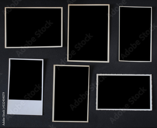 old empty photo frames  vintage photo prints  flat lay with free pics space