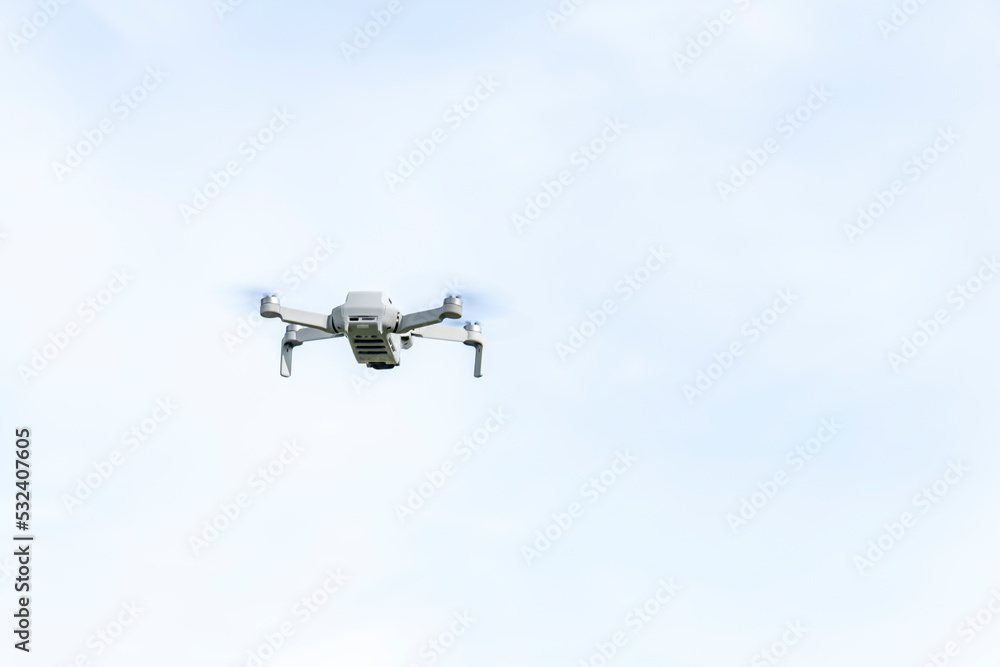 Fototapeta premium treatment of agricultural fields with unmanned quadcopters
