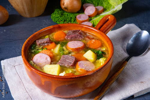 Delicious savoy cabbage stew in a rustic bowl