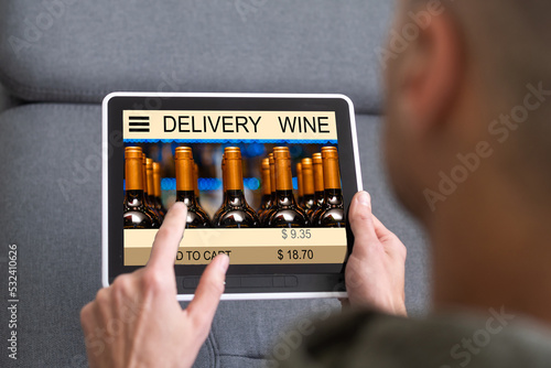 person browsing and buying wine online