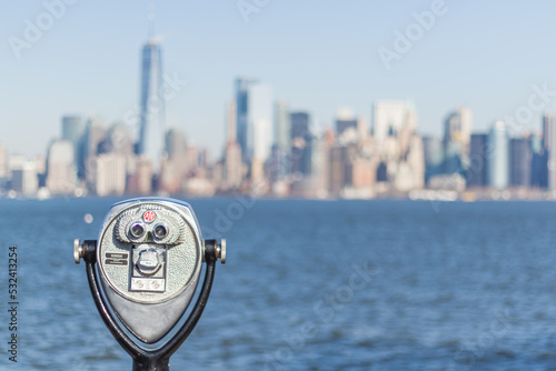 Coin operated binoculars looking out on New York City skyline