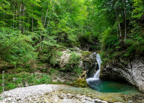 Waterfall in the wood photo