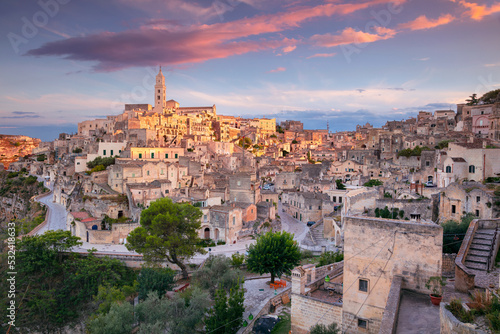 Matera, Italy. Cityscape aerial image of medieval city of Matera, Basilicata Italy at beautiful summer sunset.