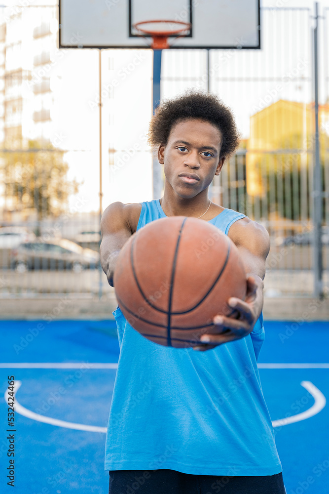 Portrait of a basketball player looking at camera