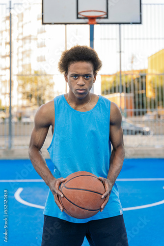 Portrait of a basketball player looking at camera