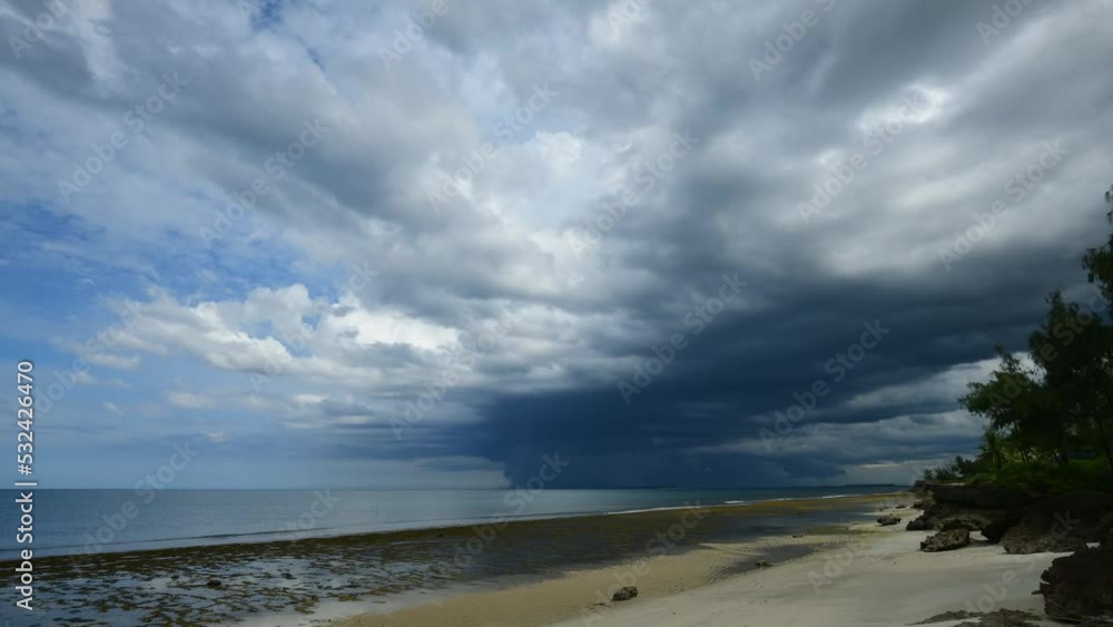 Dramatic Seascape Timelapse of Monsoon clouds and rains over the sea in Tanzania's Dar Es Sallam beach Dramatic Seascape Timelapse of Monsoon clouds and rains over the sea in Tanzania's Dar Es Sallam beach