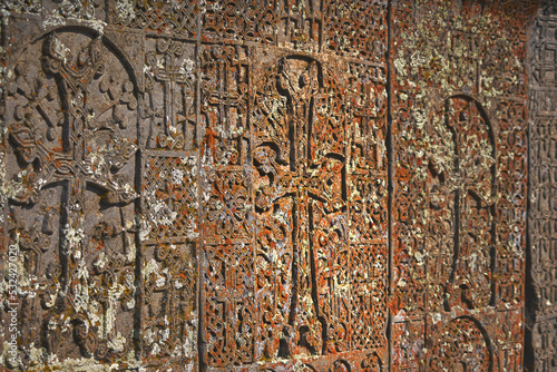 Closeup view of armenian carved khachkar with a cross photo