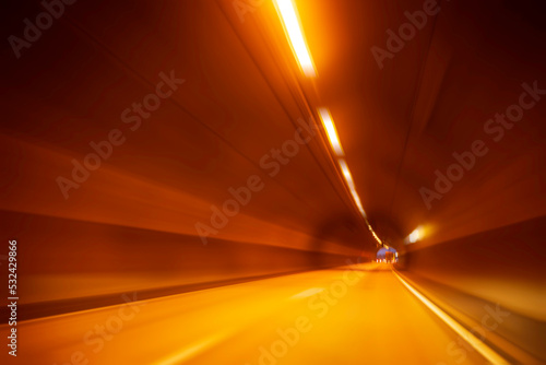 highway driving at nightfall in the tunnel