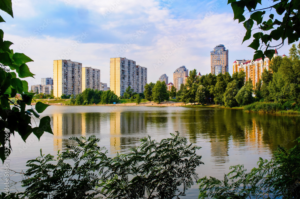 Obraz premium Modern buildings around the Verbne lake in the obolon district of Kiev, Ukraine