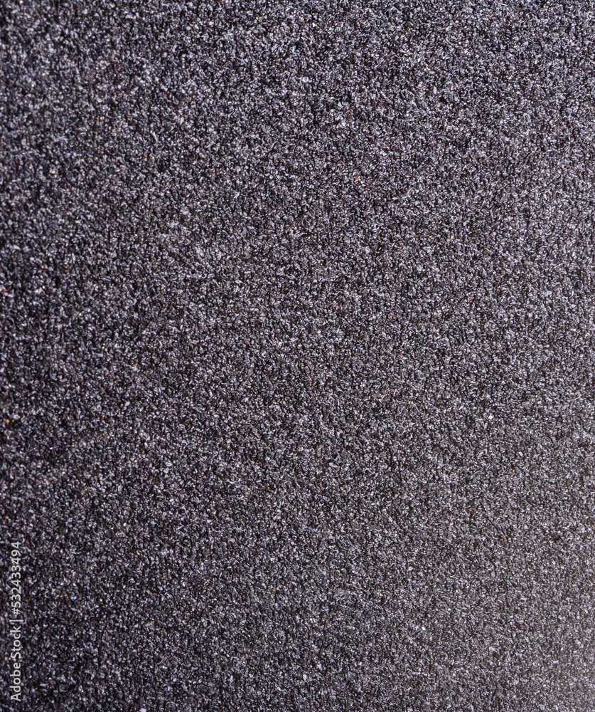 matte grungy sandpaper background closeup matte grungy sandpaper background closeup